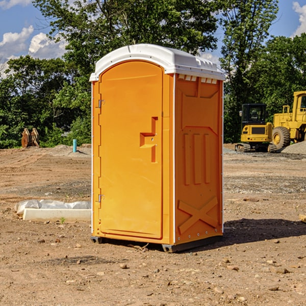 how often are the porta potties cleaned and serviced during a rental period in Grassflat